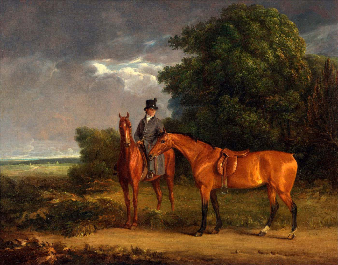 groom mounted on a chestnut hunter he holds a bay hunter